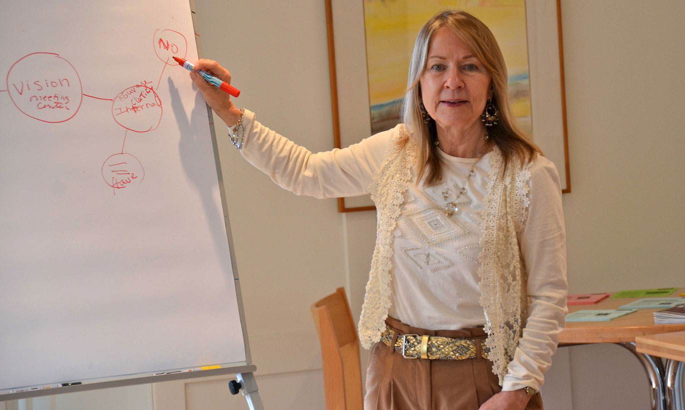 Judy-at-Flipchart_galweb title=